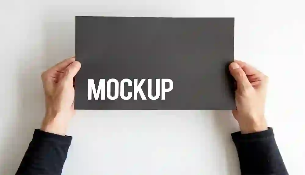 Home 27 Hand Holding Paper Card Mockup PSD Free Download